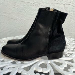 Jimmy Choo low flat boot; black leather with black suede, inside zip, size 7.5